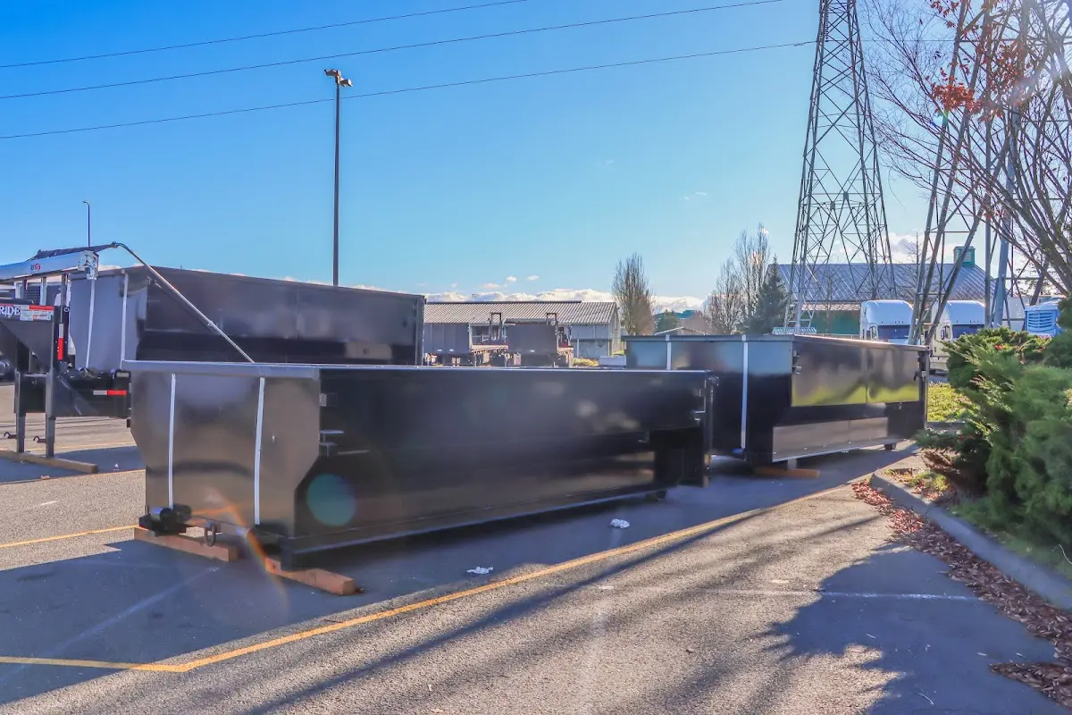 Roll-off dumpster ready for waste disposal at job site for 6 Yard Dumpster Rental in Phenix City